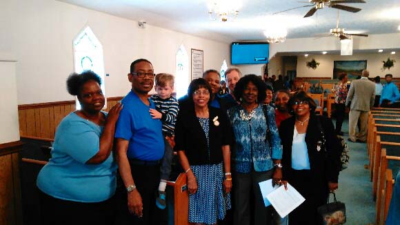 South End Missionary Baptist Church pose for a picture after their autism awareness service.